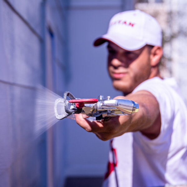 Titan Impact 400 XTRA using Titan RX-80 spraying exterior cladding