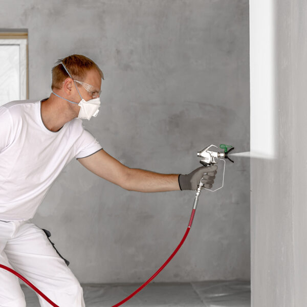 Titan Impact 400 XTRA using Titan RX-80 to spray a wall with paint